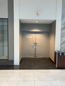 Picture of "employees only" hallway doors at a shopping mall