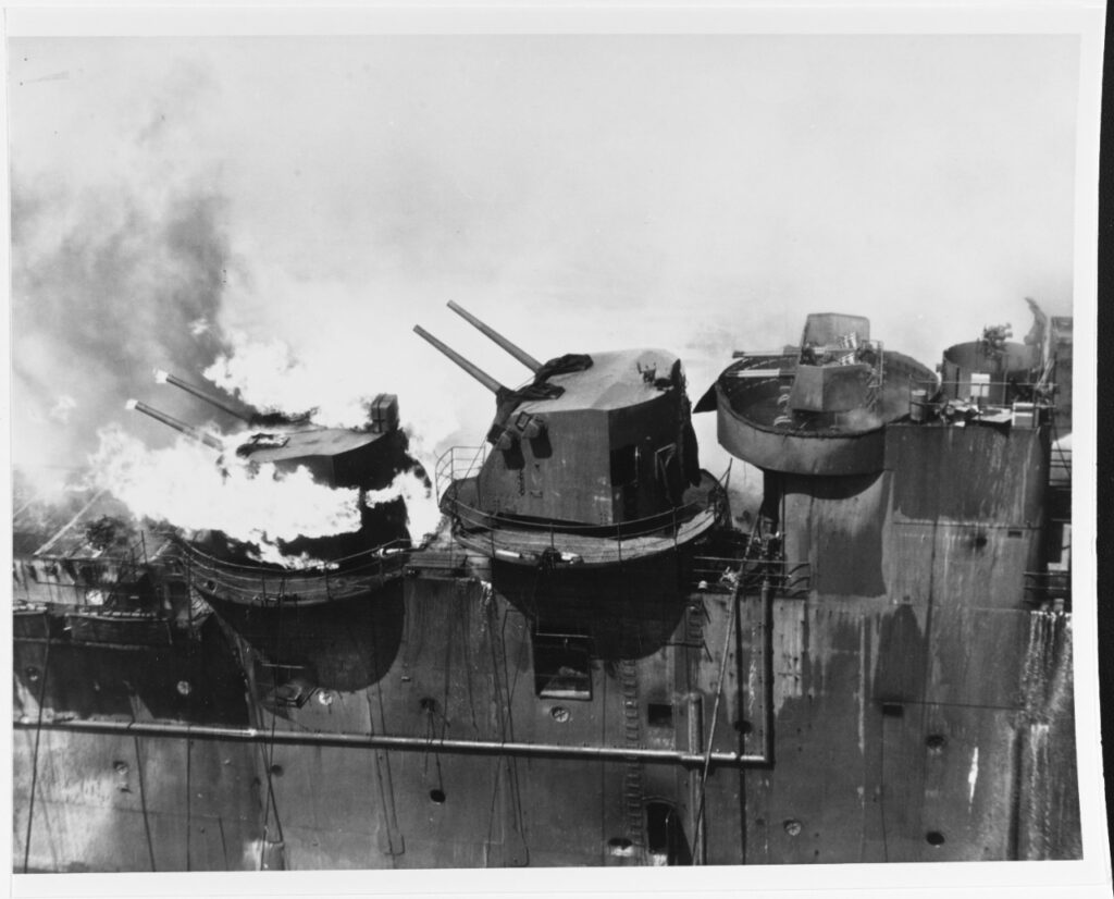 Aft-5 inch gun mount of the USS Franklin on fire. Picture taken from USS Santa Fe Credit: Naval History and Heritage Command