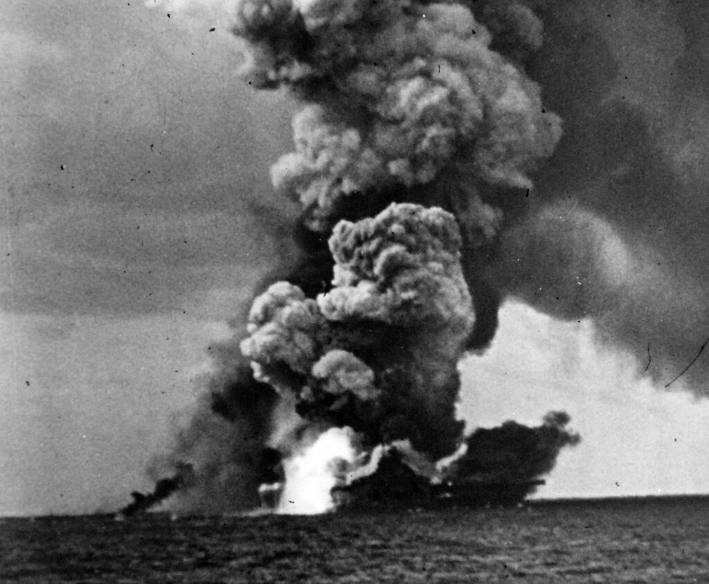 USS Franklin nearly obscured by smoke and flames after 19 March attack US Navy photo 80-G-49131