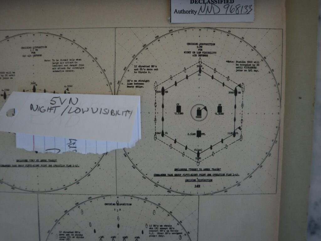 Ship formation used during limited visibility and at night by Task Force 58. In a round circle the carrier flag ship is at the center. To its port and starboard are two other carriers, with a light carrier behind it. Surrounding them are battleships, cruisers and destroyers. This formation, called 5-VD, is used when the probability of air attack is high and that of submarine attack is low.