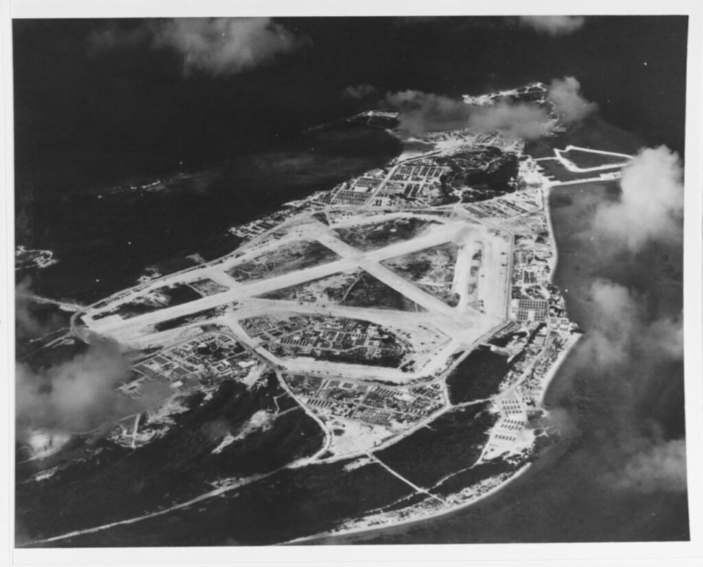 A picture of Peleliu taken from an aircraft. The airfield dominates the island taking up more than half of it.