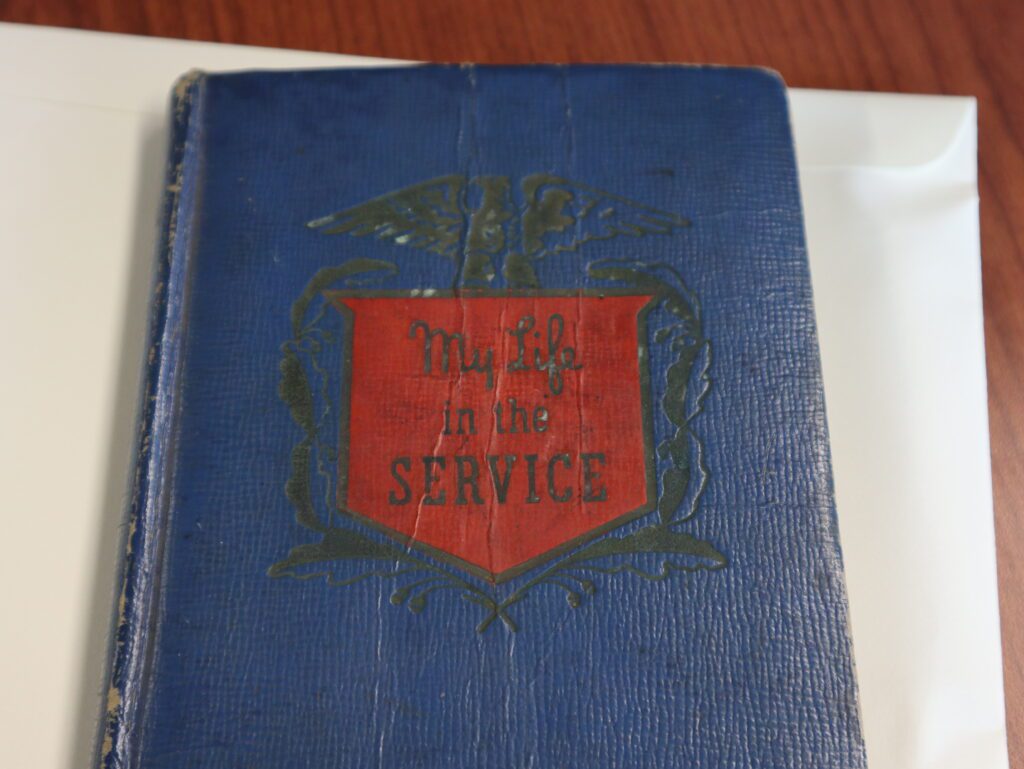 A journal given out to servicemen in the early days of World War II. The cover is blue and it is titled, "My Life In The Service."