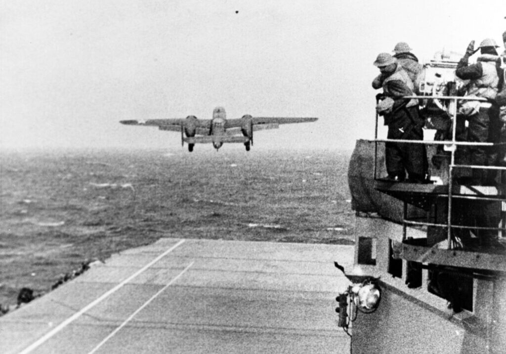 80-G-41196. An Army Air Force B-25B bomber takes off from Hornet at the start of the Doolittle raid, 18 April 1942.