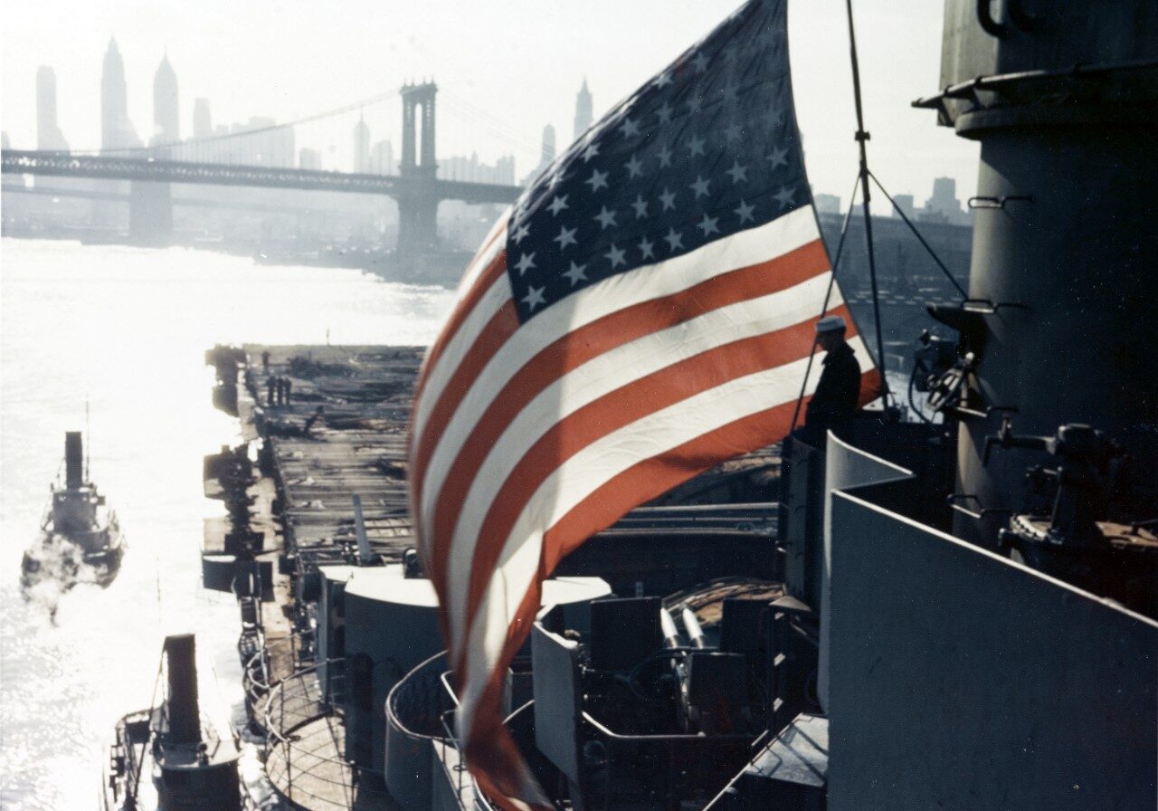 USS FRANKLIN (CV-13) arrives at New York Navy Yard for repair of battle damage, circa 28 April 1945
