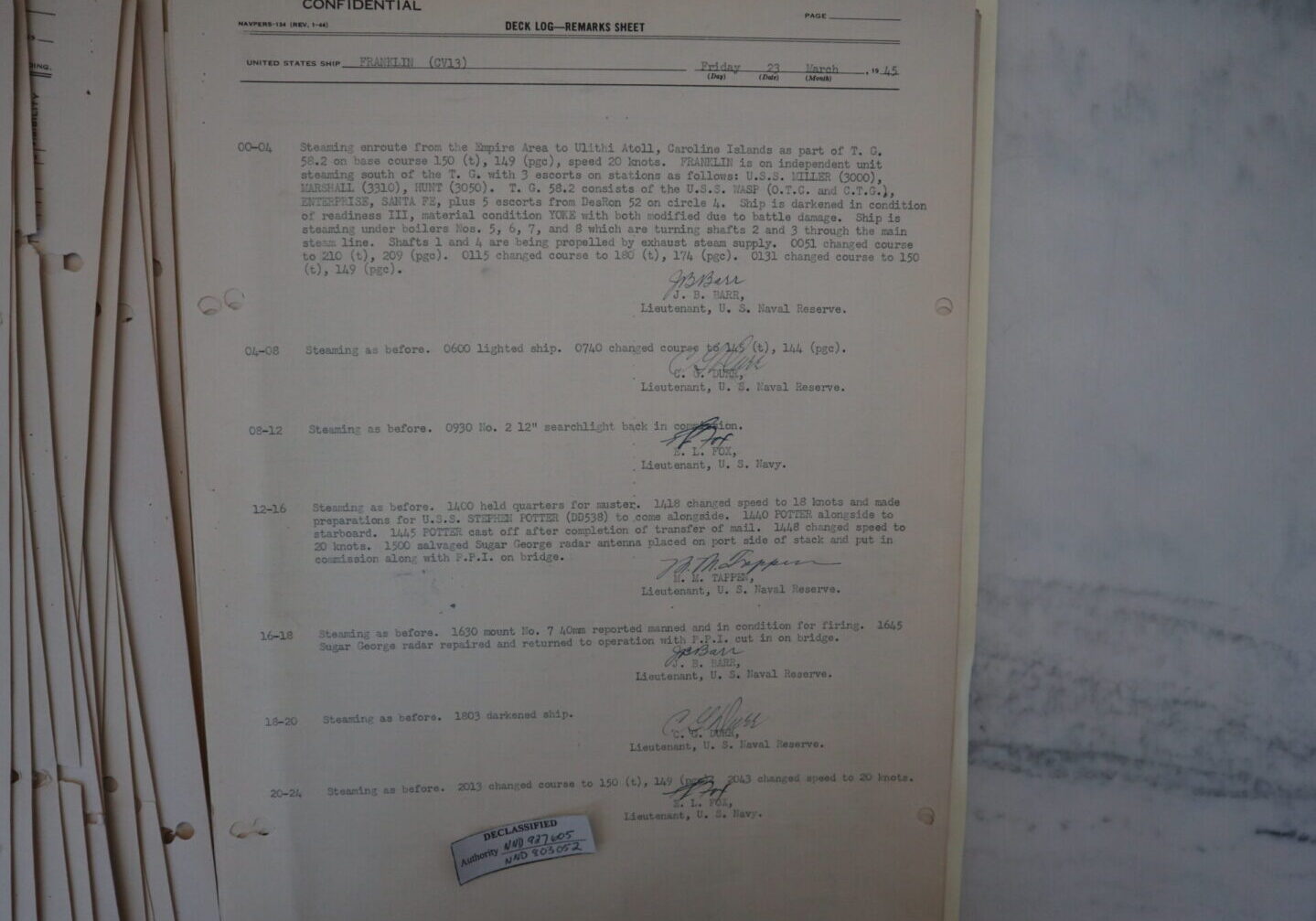 23 March 1945 deck log of USS FRANKLIN. It mentions the ship being accompanied by two other damaged carriers, WASP and ENTERPRISE along with escorts. Entries are brief compared to before the attack.