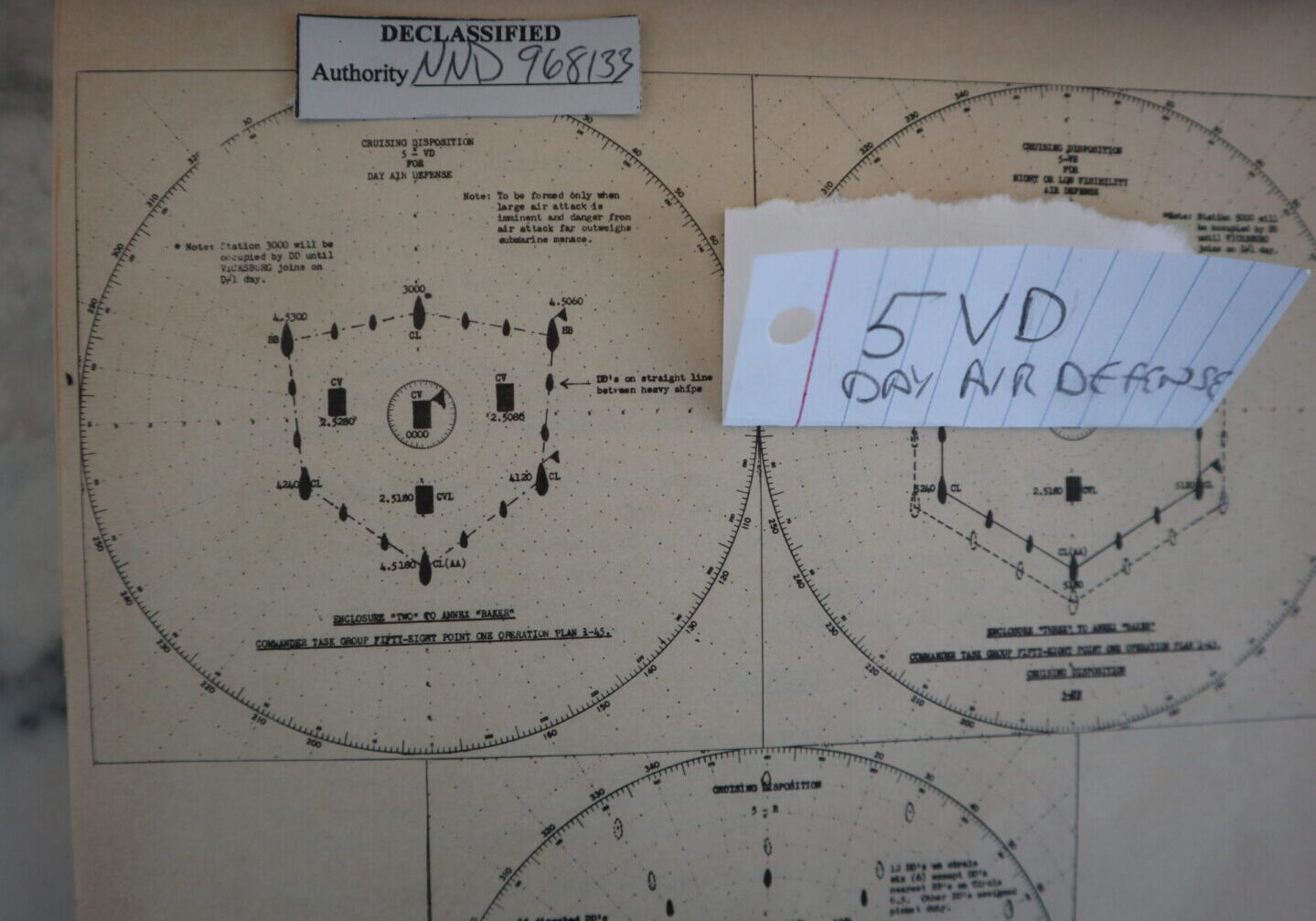 Ship formation used during daylight of Task Force 58. In a round circle the carrier flag ship is at the center. To its port and starboard are two other carriers, with a light carrier behind it. Surrounding them are battleships, cruisers and destroyers. This formation, called 5-VD, is used when the probability of air attack is high and that of submarine attack is low.