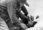 Chaplain O'Callahan giving the last rights to a sailor. The sailor actually survived.