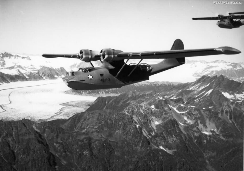 Lt. Cmdr Russell flying over a glacier near Prince William Sound. August 1942. US Navy photo