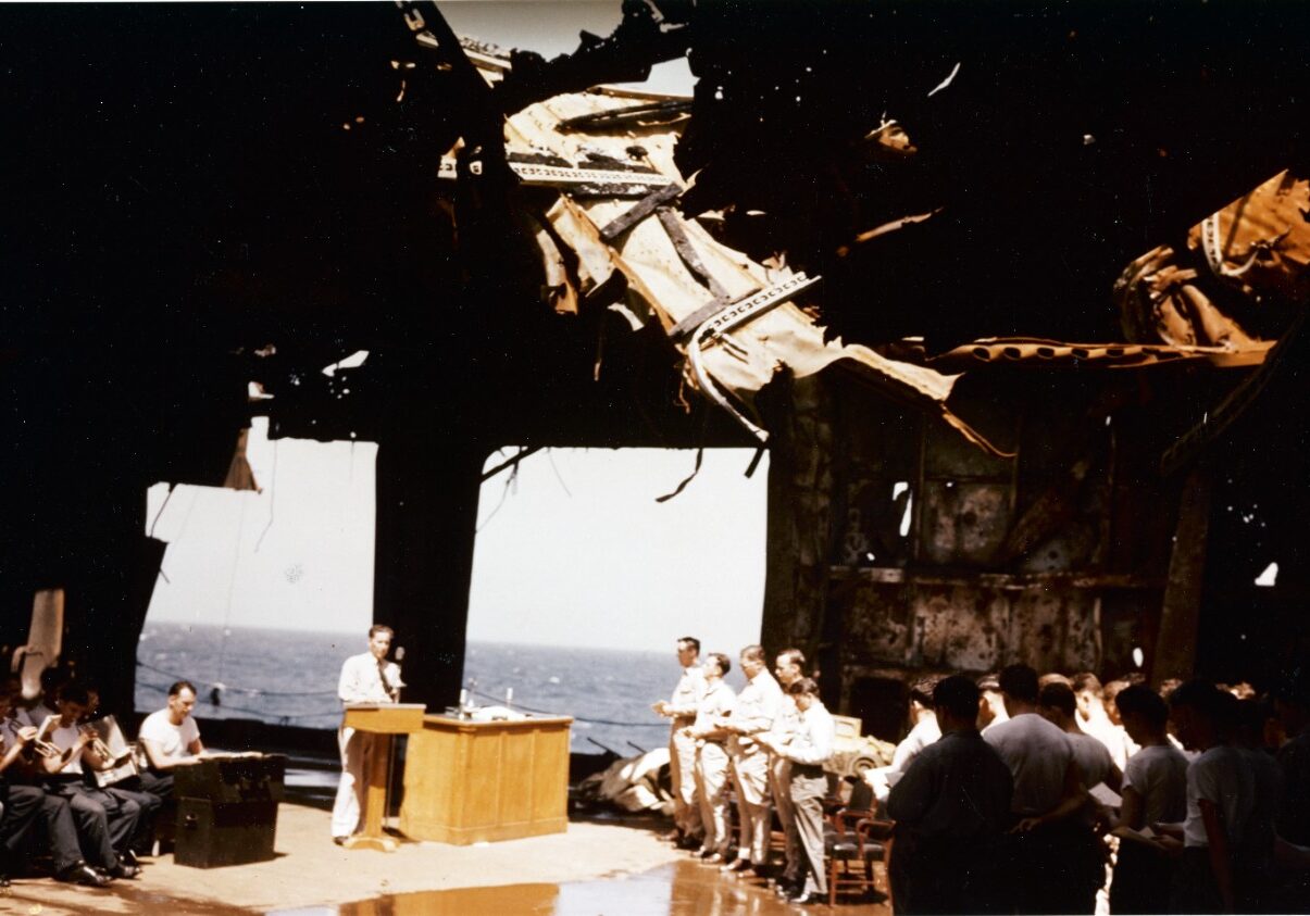 USS Franklin (CV-13) Church service on the ship's ruined hangar deck 80-G-K-5056
