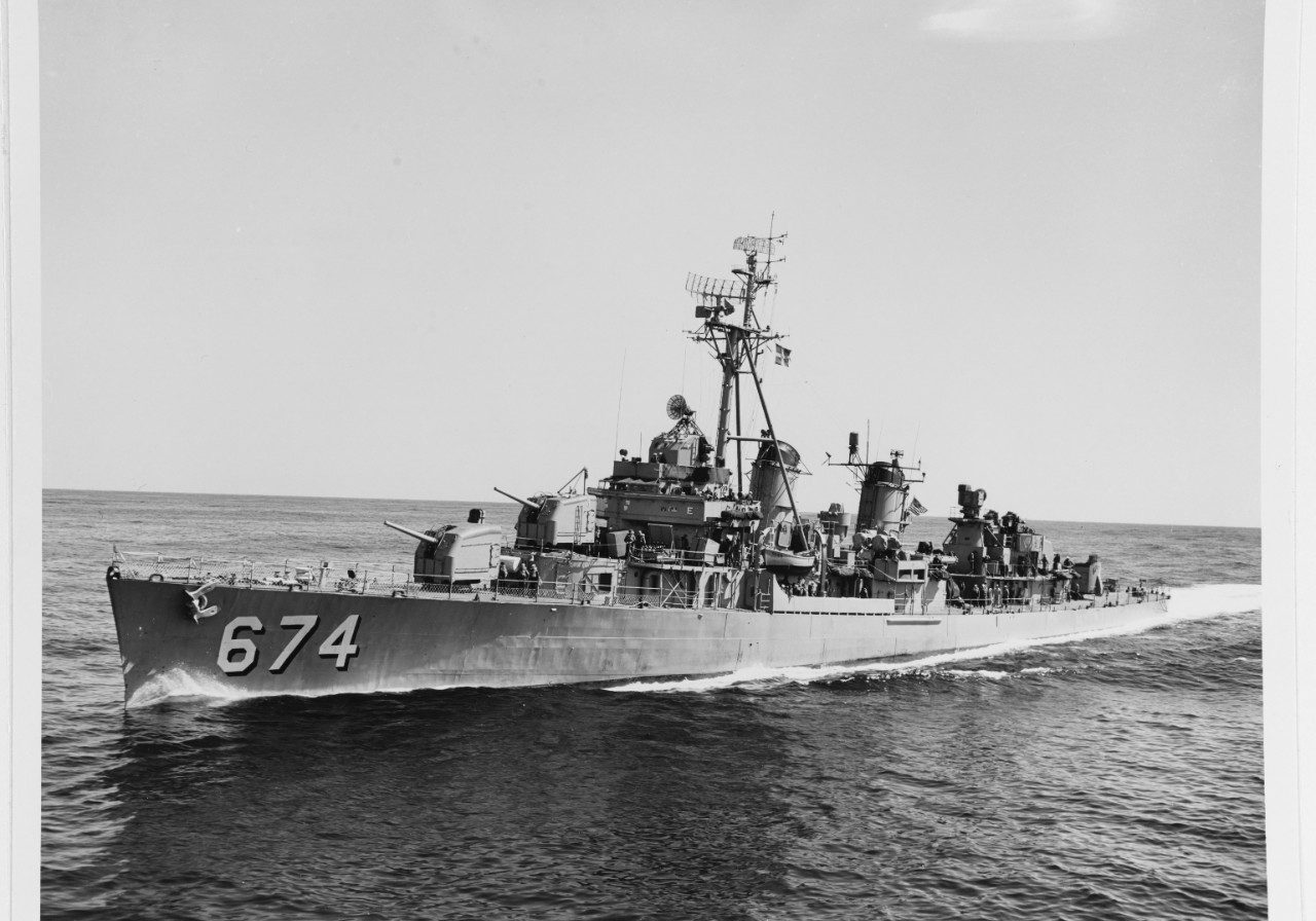 (DD-674) Coming alongside USS Tarawa (CVS-40) to refuel at sea, 25 April 1959. Official U.S. Navy Photograph, now in the collections of the National Archives. Catalog #: USN 1046540